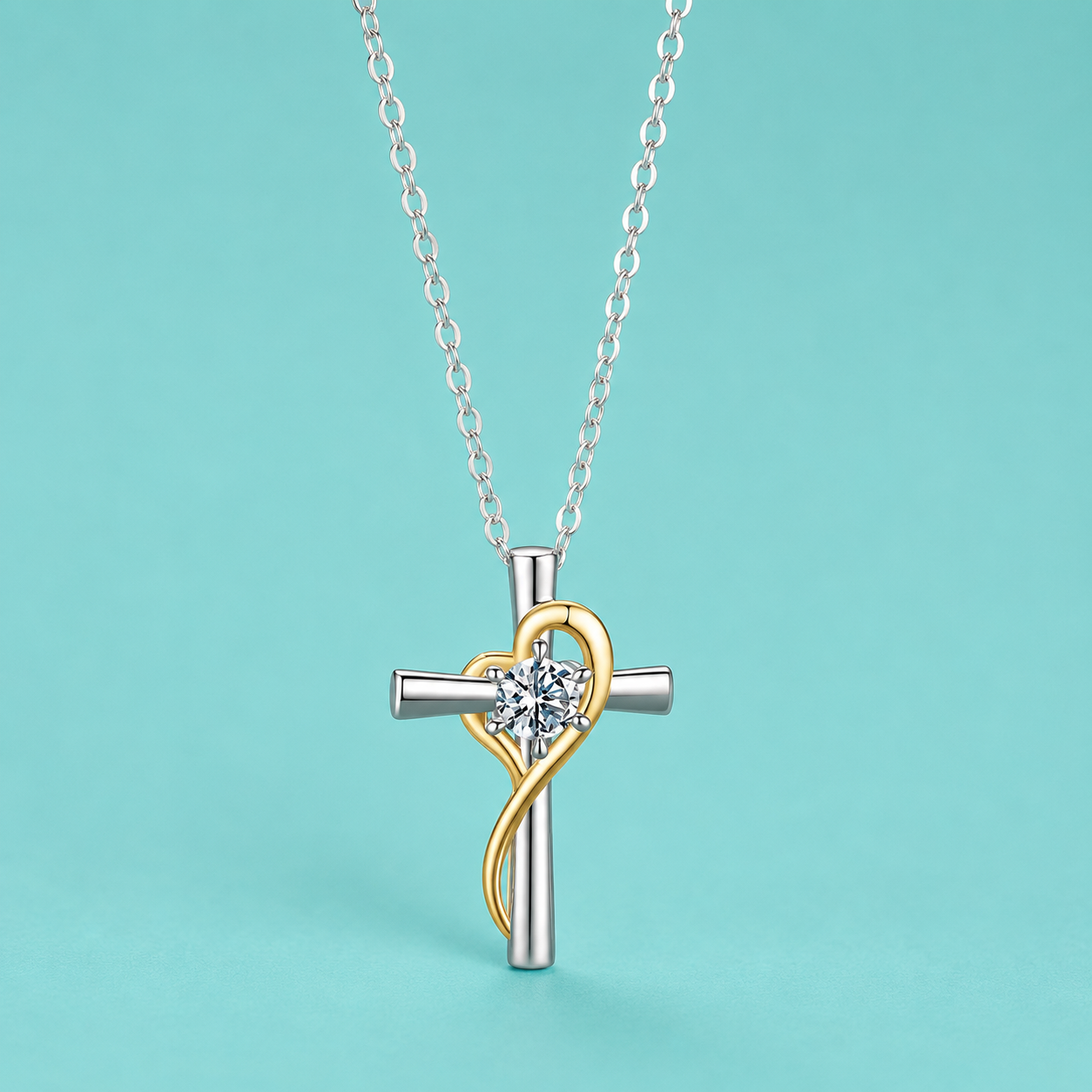 Silver cross necklace with heart pendant